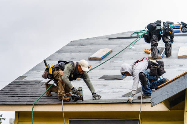 Professional Gutter Installation technician working in Clarendon, TX